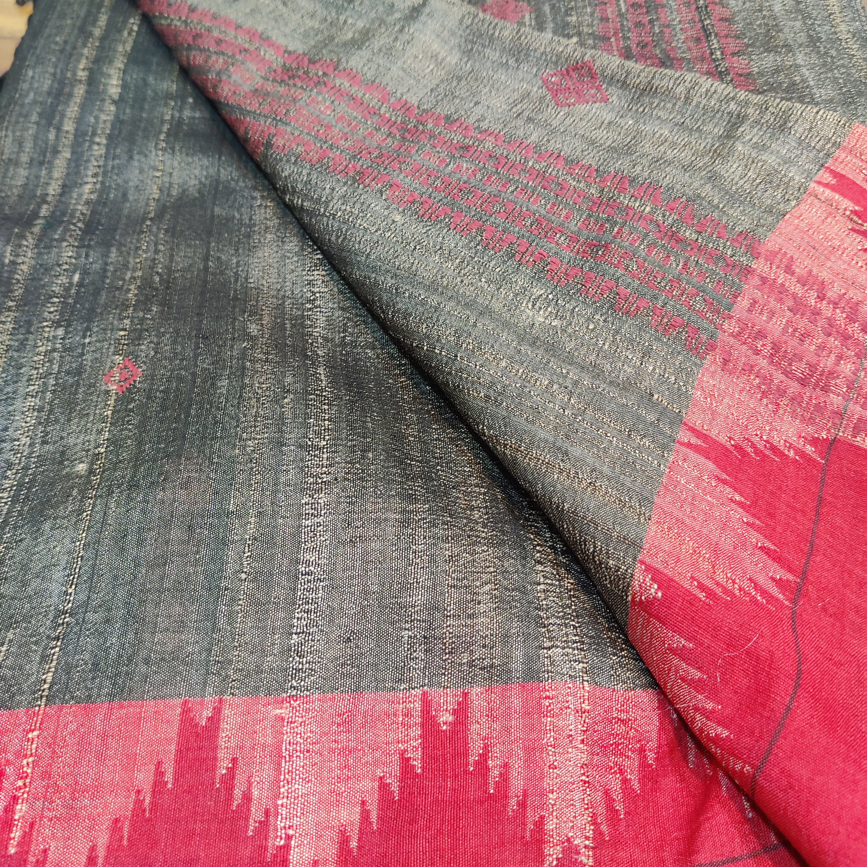 Bronze coloured Tassar kotpad with Red border